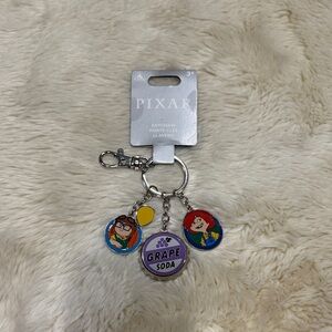 Brand New! Pixar UP Grape Soda Keychain